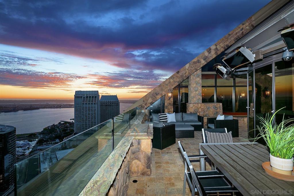 Enjoy breathtaking 360-degree ocean, San Diego bay, Downtown cityscape & surrounding landmark views! Along with views from every room, you will be embraced by thoughtful design that takes full advantage of the dramatic architecture & incorporates the finest finishes creating an exceptional private paradise soaring above the city! Located on the 41st floor, you will be greeted by the grand foyer that leads to the main living level with formal living & dining rooms, a gourmet kitchen, 2 en-suite bedrooms & the first of 3 outdoor spaces, spacious & complete with an outdoor kitchen. The second floor is dedicated to the expansive primary retreat that provides sitting & office areas, luxurious spa-inspired bath & two terraces! Harbor Club continues to be an icon of luxury living with an abundance of resort style amenities! Rarely does the opportunity come along to own one of the few, true penthouses in Downtown San Diego. Enjoy breathtaking 360-degree views of our unique & special San Diego landscape that includes ocean, San Diego bay, Downtown cityscape & surrounding landmark views. Along with views from every room, you will be embraced by thoughtful design that takes full advantage of the dramatic architecture & incorporates the finest finishes creating an exceptional private paradise soaring above the city! Located on the 41st floor, you will be greeted by the grand foyer that leads to the main living floor with formal living & dining rooms, a gourmet kitchen with custom cabinetry, breakfast bar & top of the line appliances, 2 bedrooms, both en-suite & the first of 3 outdoor spaces, spacious & complete with a pizza oven & Evo grill. The second floor is dedicated to the expansive primary retreat that includes sitting & office areas, luxurious spa-inspired bath & two more outdoor terraces! Harbor Club continues to be an icon of luxury living with an abundance of resort style amenities; a pool, spa, sauna, fitness center, clubhouse, firepits, sitting & BBQ areas are just a few of the ways to relax in comfort & style! An ideal location offering a tranquil retreat while remaining conveniently close to vibrant attractions and amenities. Enjoy a stroll along the harbor, take in a Padres game and plenty of restaurants, nightlife and entertainment are yours to enjoy!