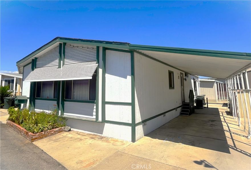 All age community, centrally located in North Orange County near the 91/57 freeway with convenient access east-west and north-south...Cal-State University at Fullerton and Fullerton Community College minutes away....Home offers floorplan with living room-formal dining area opening up to kitchen, higher ceilings expanding its size....2 large bedrooms....Primary bedroom mirrored closet doors, ceiling fan, Walkin closet storage area, large primary bath and walk-in shower....2nd bedroom large....Open kitchen with refrigerator included, dishwasher, gas R/O, Indoor laundry room washer/dryer included.....Oversized windows....Covered carport....Forced and Central Air for comfort....An all age community Rancho La Paz featuring Pool, Clubhouse, Game Room, Kitchen, BBQ area, and more....