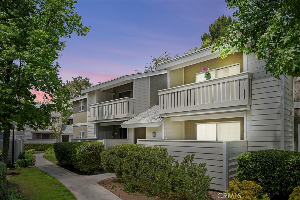 Located in the picturesque hills of Santa Clarita, this exquisite 2-bedroom, 2-bathroom condominium presents an ideal living environment. Positioned on the second floor, the residence offers a welcoming sense of privacy and is move-in ready.
Upon entry, one is greeted by a spacious, open floor plan that benefits from an abundance of natural light, being thankful to the sliding glass doors that lead to a balcony with neighborhood's view . The kitchen, conveniently located to the left, features elegant granite countertops, stainless steel appliances, and a breakfast counter complemented by a window.
The living room showcases high vaulted ceilings, imparting an atmosphere of grandeur to the space. Both bedrooms are well-appointed, with each featuring en suite bathrooms and large windows that provide beautiful views. Notably, the primary bedroom includes a generous walk-in closet.
Additionally, the property offers covered parking, ensuring convenience and protection from the elements. Overall, this condominium is an exceptional opportunity to embrace the serene and tranquil lifestyle that Santa Clarita has to offer