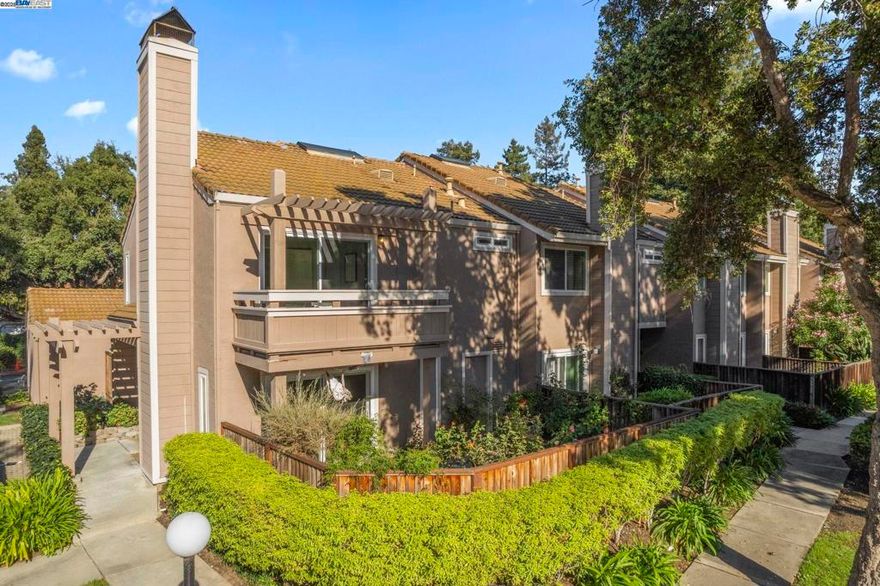 Beautifully Updated Corner Unit in a Prime Fremont Location! Located within a highly rated Fremont school district, this thoughtfully updated home offers modern finishes, dual private patios, and an ideal location just steps from the community pool and amenities. Enjoy a bright, airy living space with vaulted ceilings, abundant natural light, and a cozy wood-burning fireplace. The updated kitchen features quartz countertops, sleek cabinetry, tile backsplash, and stainless steel appliances including a new stove with built-in air fryer. The vaulted primary suite is a peaceful retreat with a private balcony and spa-style ensuite. Additional highlights include dual-pane windows, blackout blinds, a brand-new energy-efficient HVAC system, ceiling fans in every bedroom, and crown molding throughout. HOA offers resort-style pool, spa, and tennis courts. Minutes to Lake Elizabeth, shopping, dining, and easy freeway/BART access—this home truly has it all!