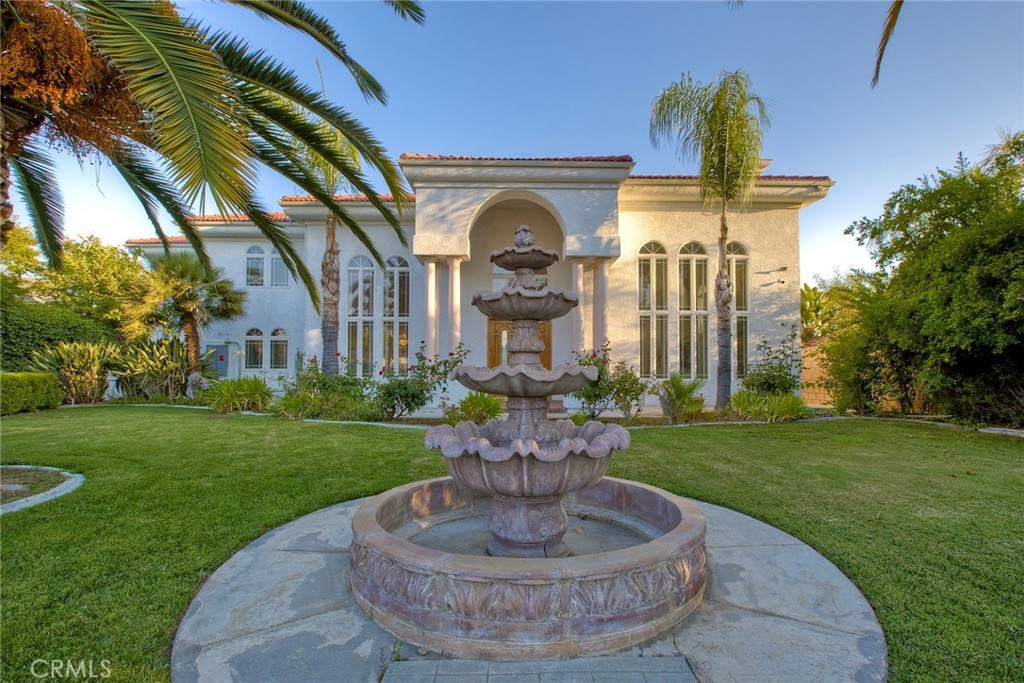 The Majestic Beauty of 44273 French Circle, Hemet — A Home of Elegance, Luxury, and Innovation. This spectacular 5-bedroom, 5-bathroom estate boasts 5,749 square feet of luxurious living space on a lush half-acre lot adorned with exotic fruit trees and stately palms. Every detail has been crafted for both comfort and wow factor, redefining what it means to live well.
From the curb, majestic palm trees and mature landscaping create a warm, private welcome. Built to the highest standards with 2x6 exterior framing and extra insulation, the home offers enduring comfort, energy efficiency, and exceptional quiet. Step inside to soaring ceilings and abundant natural light, especially in winter months when sunlight fills and warms the home naturally.
At the heart of the home lies a chef’s dream kitchen—crisp white cabinetry, gleaming granite countertops, and stainless steel appliances. Highlights include a professional-size refrigerator, built-in trash compactor, and an open flow to the expansive living area. Here, one of three fireplaces adds warmth, while a built-in surround sound system sets the tone for movie nights or gatherings.
The spacious family room, complete with wet bar and natural light, is ideal for entertaining. Fireplaces in the family room, master suite, and living room ensure cozy comfort throughout. Upstairs, a large library with a built-in theater sound system offers a multifunctional space for work, study, or play.
Modern conveniences include a whole-house intercom, security camera system, central vacuum, and surround sound throughout. A laundry chute leads to the oversized laundry room with folding station and built-in sewing desk. Four independent HVAC units, four heaters, and a humidifier system ensure perfect climate control in every zone.
A dedicated exercise room provides space for fitness, meditation, or a second office.
The backyard is a true destination—heated pool, jacuzzi, tropical landscaping, and multiple exotic fruit trees create the perfect backdrop for relaxation or entertaining.
A fully paid solar system with backup battery, superior insulation, intelligent climate zones, and passive winter sunlight design make this home as smart as it is stunning.
44273 French Circle is not just a residence—it’s a carefully designed estate that blends beauty, functionality, and enduring value.
Welcome to your dream home—elegant, intelligent, unforgettable.