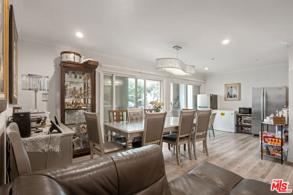 Bright and spacious 3-bedroom, 2-bathroom unit located in a highly desirable Beverly Hills location. The kitchen has been beautifully remodeled with custom cabinet and recessed lighting, adding a modern touch throughout the space.Enjoy indoor-outdoor living with sliding glass doors that open to a balcony ideal for relaxing .Additional features include in-unit central heat and AC, washer and dryer, two designated parking spaces, and two storage units.Conveniently situated near Pico Boulevard, with easy access to markets, dining, and shopping.