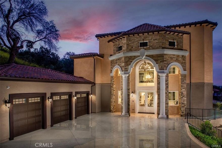 Experience the pinnacle of luxury living in this majestic Tuscan-inspired estate, nestled within the prestigious gated community of The Country Estates in Diamond Bar, CA. Crafted by Grandway, this stunning six-bedroom residence showcases architectural splendor with elegant arches, colonnades, and meticulous details throughout. Situated on approximately 63,000 square feet of meticulously landscaped grounds, this opulent three-story home offers quality finishes and exquisite craftsmanship.



Step into the grand foyer through dramatic double doors, where soaring 30-foot ceilings, elegant marble floors, and a beautiful iron staircase welcome you. Entertain guests in the formal living room, boasting French doors that open to a full-length terrace overlooking panoramic city views. Indulge in culinary delights in the gourmet kitchen, complete with a large island, marble counters, custom cabinetry, and high-end Thermador appliances.



The main level also features a guest bedroom, study/home office, mudroom, and elevator leading to the upper floors. Upstairs, discover a spacious family room, game room, home theater, laundry room, junior suite, and two additional ensuite bedrooms. The secluded Primary bedroom suite on the top floor offers a private living room, double-sided marble fireplace, and a step-out balcony with breathtaking vistas.



Luxuriate in the spa-like Primary bathroom, featuring a freestanding tub set against bay windows, two walk-in closets, his and her vanities, and a steam shower. Additional highlights include hardwood floors, a three-car garage with epoxy floors, three tankless water heaters, five A/C condensers, and state-of-the-art home automation.



Outside, serene terraces, balconies, and patios provide the perfect setting for outdoor living and entertaining. Community amenities include two gated entrances, 24-hour security patrol, clubhouse, tennis/basketball courts, pool, and walking trails.



Don't miss this opportunity to own a piece of luxury in Diamond Bar's most sought-after enclave. Schedule your private viewing today!