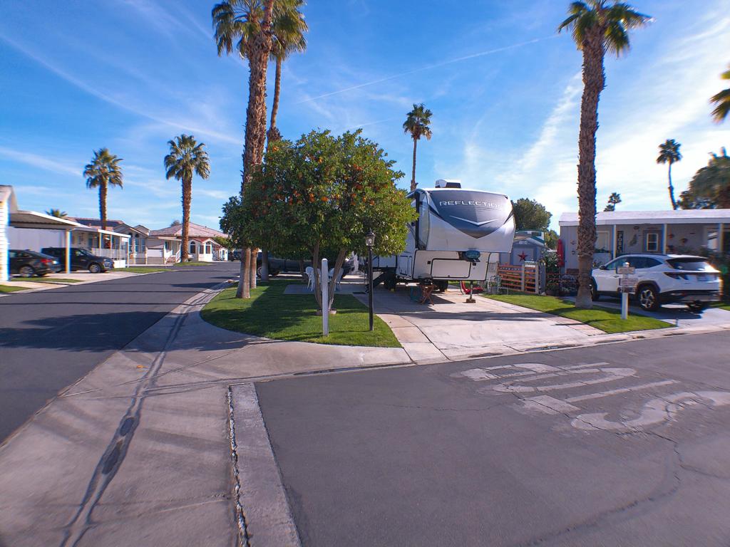 Wonderful Corner Lot close to Club House 1. This lot offers 2 fruit trees and shed. The parking is on the side yard at back of lot.