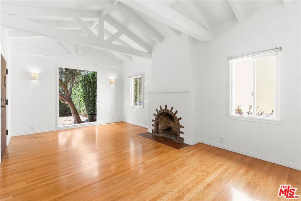 Atwater Village living at its finest! Offered both for lease and for sale, this charming Spanish-style duplex is ideally situated just a few doors down from Glendale Blvd, providing you with exceptional access to all the great shops, cafes, and boutiques that Atwater has to offer. As you approach the property, the captivating arches and classic Spanish tile roof immediately draw you in. Being offered for lease is the 2 bed 1 bath front unit which features delightful character with its cozy fireplace, beamed ceilings, open floor plan, gleaming wood floors, and large picture windows that flood the space with natural light. The home opens up to a large, fenced yard, perfect for hosting weekend barbecues, gardening, or simply unwinding in the sunshine. Included with the home is a large 2-car garage which could potentially serve as a creative space or home office. The combination of a desirable location and versatile living arrangements makes this a must-see for anyone considering Atwater Village. Don't miss your chance to explore the possibilities!