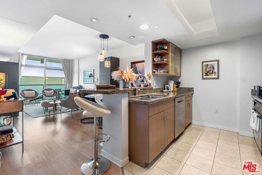 The perfect north facing 1 bedroom, 1 bath condo in the full service Azzurra. This well-priced unit features hardwood flooring, floor-to-ceiling glass walls, high ceilings, granite counter tops in kitchen and baths, all stainless steel appliances, large balcony, and 2 car parking. Enjoy luxury full-service, high-rise living with unbeatable amenities and services: cable, fiber optic Internet, 24-hour security and front desk/concierge, complimentary guest valet parking, rooftop spa and sky lounge with 360 degree panoramic ocean, city and mountain views, outdoor kitchen, sparkling heated pool and spa, business center media lounge, fine art collection, indoor and outdoor fitness center with yoga/Pilate's training studio and more. Ideal location close to shops, restaurants, beach bike pate, beach, dine-in movie theaters. Easy freeway access and LAX close. Also available fully furnished for 4700