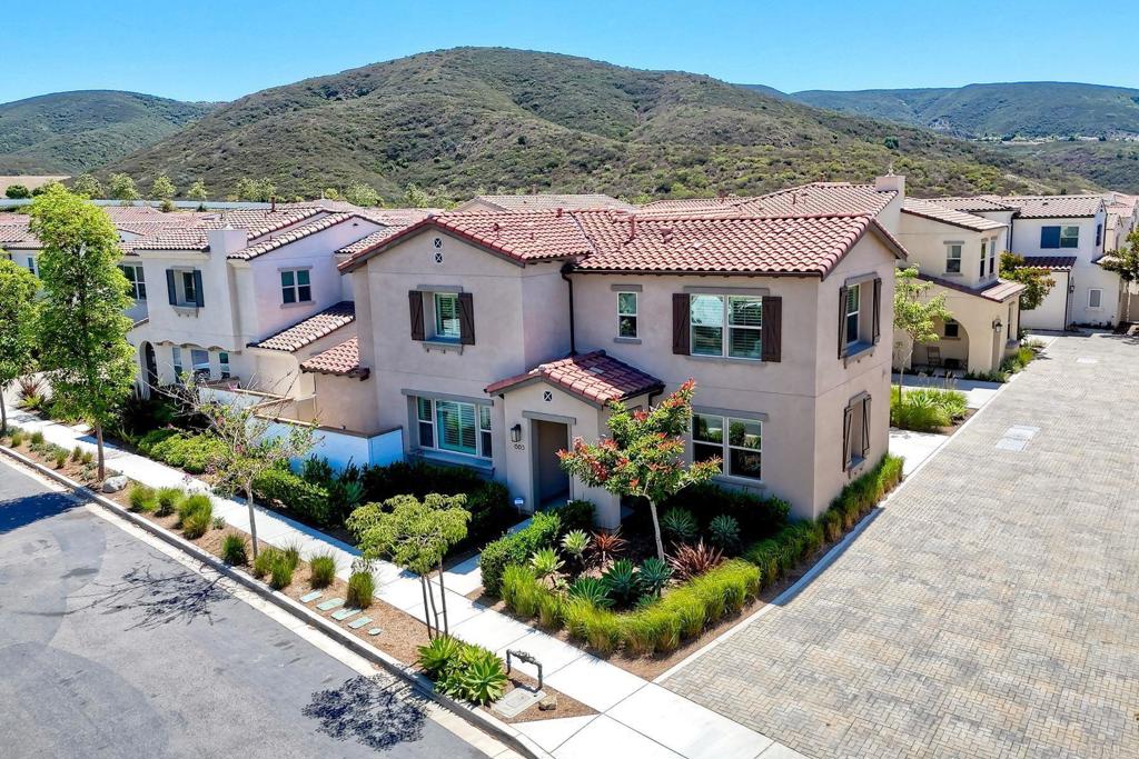 Welcome to this beautifully maintained Vientos Residence 2R home located in the desirable gated community of Rancho Tesoro. This spacious home offers 4 bedrooms, including a first-floor bedroom with a full bath, 3 full bathrooms, and 2,684 sq ft of living space with numerous builder upgrades throughout. The open-concept main floor features upgraded flooring, a large living area, and a gourmet kitchen with white cabinetry, tile backsplash, stainless steel appliances, and a buffet-style dining area ideal for everyday living and entertaining. The professionally designed backyard includes pavers and a custom-built waterfall feature, creating the perfect setting for outdoor dining or relaxing summer evenings. Upstairs, the primary suite includes a spacious walk-in closet and a luxurious ensuite bathroom with a frameless glass shower, soaking tub, and dual vanities. Three additional bedrooms and multiple storage/linen closets complete the second floor. Additional features include: Leased solar system (buyer to assume), Upgraded ceiling fans, Pocket door in downstairs bedroom, Laundry room with sink and cabinetry, Plantation shutters, 4" baseboards, and much more! Enjoy resort-style community amenities including a pool, BBQ area, playground, and scenic trails. Located near top-rated schools, shopping, dining, parks, and more. Low HOA and Mello-Roos fees. Seller to select services. All information deemed reliable but not guaranteed. Come view this beautiful home today!