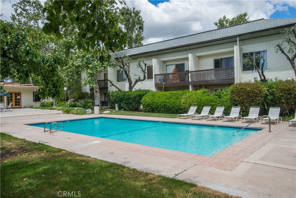 Welcome to the Old Orchard Condos! This second-floor unit features 2 bedrooms, 2 bathrooms, a large family room, a balcony, and a view of the nearby public park. Ideally situated close to top-rated schools, entertainment, fine dining, retail stores, and just minutes from the 5 freeway, this is an opportunity you won't want to miss. Priced for a fast sale!