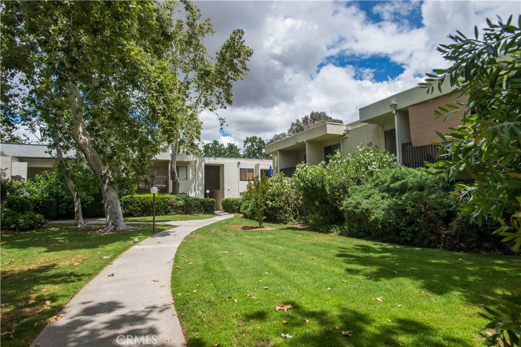 Welcome to the Old Orchard Condos! This second-floor unit features 2 bedrooms, 2 bathrooms, a large family room, a balcony, and a view of the nearby public park. Ideally situated close to top-rated schools, entertainment, fine dining, retail stores, and just minutes from the 5 freeway, this is an opportunity you won't want to miss. Priced for a fast sale!
