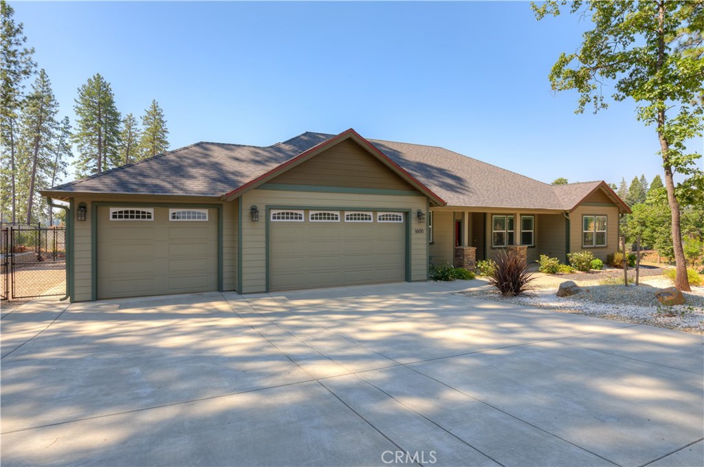 Fabulous home and setting on 1.9 acres in the heart of Paradise you will find this high quality open floor plan home built by Anderson Brothers. Vaulted ceiling in living and dining room and coffered ceiling in the spacious master bedroom w large walk in closet. Beautiful kitchen with breakfast bar and ample cabinets and granite counter tops. Whole house fan plus central heat n air. Covered front porch and back patio with a roomy gazebo. 3 bedrooms, tile bathrooms plus a half bath by the 3 car attached garage. Landscaped front and back with automatic drip watering system. Fenced backyard, fenced storage area.
Room to build an ADU upon town approval, water supplied by Paradise Irrigation District
