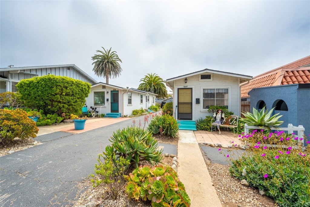 Opportunity knocks with this possible development property in the downtown core of morro Bay. This vintage duplex has approved plans for a 3rd unit, plus the property may have an additional ADU and a Jr. ADU on the property. The current unit mix consists of a 2/1 and a 1/1 free standing units with each having individual yards and rear single car garages. The roof and rain gutters were recently replaced and the units bring great rents, being so close to the Embarcadero. This property has fantastic upside potential.