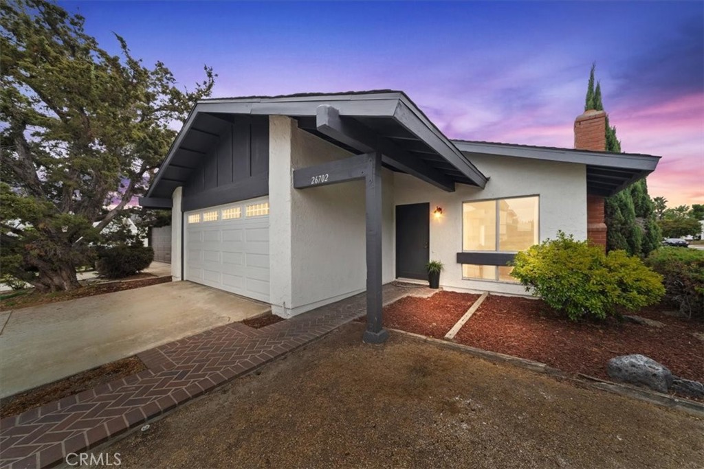 Beautifully Upgraded and Remodeled Home. NO HOA & NO HIGH TAXES! Perfect location near freeways, Lake Mission Viejo, shopping and is situated on a corner lot!. This property also ELIGIBLE to be part of the Lake Mission Viejo should you ever want to be part of their HOA. Seller did a complete Remodel that includes a BRAND NEW ROOF! As you walk in you will feel at home with the brand new vinyl wood-like floors and all new interior paint. Sit back and relax and enjoy the cozy living room with a brick fireplace that is perfect for ambiance and warmth. BRAND NEW Kitchen overlooks your backyard where you can watch your kids and family gather for family fun. Kitchen features Brand new soft close cabinets, new sink, new quartz countertops, and brand new stainless steel appliances that you will love. Primary suite has a walk-in closet and access to the bathroom with its own private toilet and sink area. All bedrooms have brand new carpet as well. Seller installed a BRAND NEW AIR CONDITIONING SYSTEM and the electrical outlets have been replaced. Enjoy the Large spacious backyard that has a concrete slab patio and tons of room to add a pool. There is room to entertain, BBQ, and room for all your pets and family to enjoy. Exterior has all new paint adding curb appeal to this cozy home. This is a beautiful well established neighborhood that you will love as much as the past owner did.