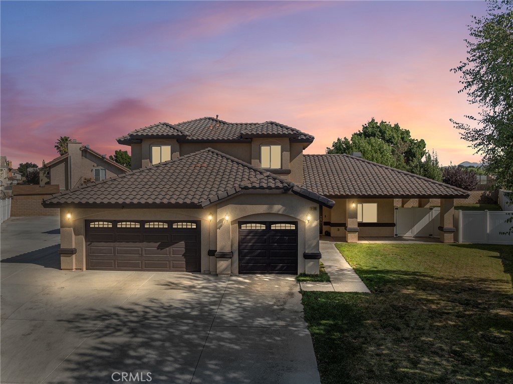 Welcome to 18490 Trout Lane, a beautifully upgraded home nestled on nearly 11,000 sq ft cul-de-sac lot in the prestigious Spring Valley Lake Community—where luxury living meets everyday convenience. This stunning 3-bedroom, 4-bathroom home offers 2,265 sq ft of thoughtfully designed space with every upgrade you could want. Step inside to find premium flooring leading you into a bright and inviting formal dining area plus kitchen nook, living room complete with a custom fireplace and designer lighting. Your eyes are immediately drawn to the showstopping gourmet kitchen, featuring an oversized island, gleaming Carrera marble countertops, stainless steel appliances, ample cabinetry plus pantry, and even a wine cooler—ideal for entertaining in style. The main level includes a luxurious Primary Bedroom suite with walk-in closet and a beautiful barn door to bathroom with dual vanities, soaking tub, separate walk-in shower, and elegant finishes that evoke a spa-like experience. Spacious laundry room with built-in cabinets. Guest powder room with a door to back yard for added convenience. As you travel upstairs, you will appreciate the attention to detail with upgraded wrought-iron balusters and premium carpeting leading to two generously sized guest bedrooms each offer their own private en-suite full bathrooms—perfect for guests or multigenerational living. The 3-car garage features epoxy flooring and automatic door openers on both doors. The RV parking area is huge. Additional upgrades include a tankless water heater and smart Nest thermostat system for energy-efficient living. Enjoy all the amenities Spring Valley Lake offers: You'll have access to a 200-acre lake perfect for water sports, a beautiful beach area for sunbathing & swimming plus 14 fishing areas for the avid angler. The community center provides a hub for social gatherings and activities, while the 24-hour security patrol ensures peace of mind. If you're looking to elevate your lifestyle, joining the Bear Valley Country Club inside Spring Valley Lake is an enticing option. Here, you can indulge in the challenging 18-hole Robert Trent Jones championship golf course, play tennis, pickle ball or racquetball, work out in the fitness center, take a refreshing swim in the Olympic sized swimming pool or relax in the jacuzzi or sauna. This home is more than move-in ready—it's a lifestyle upgrade waiting for you.