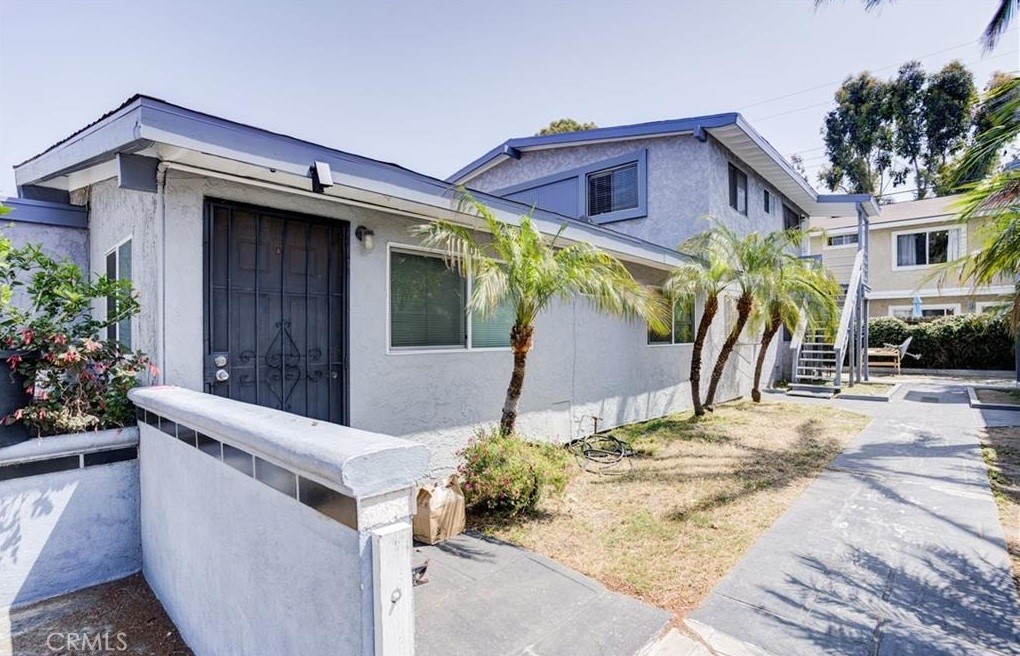 Income-producing triplex in Central Costa Mesa near Wilson, Harbor and Fairview, minutes to the beach, South Coast Plaza, major freeways and John Wayne Airport. All three 2 bed 1 bath units include a private one-car garage plus an additional parking space. Units A and B are downstairs with rear patios that include exterior laundry hook-ups, and Unit C is an upstairs unit with a private deck and no laundry hook-ups. Recent improvements include a newer roof, dual-pane windows, upgraded electrical in all units, vinyl perimeter fencing, laminate flooring in Unit B and ceiling fans in Unit A. Tenants pay utilities except water and trash. The property is fully occupied at strong rents, producing a stronger-than-average gross cap rate for the Costa Mesa triplex market. Interior photos were taken prior to the current tenants.