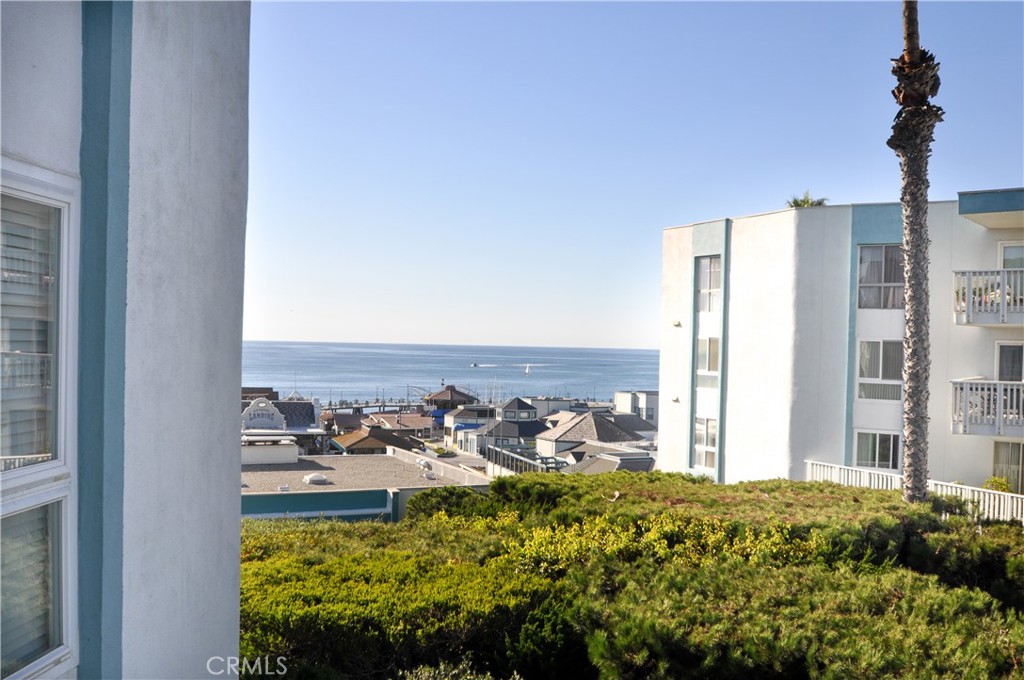 Experience South Bay beach resort-like living in this beautifully updated, open concept, ocean view condo just steps to the beach! As you enter the condo, you'll notice the lovely updated kitchen with a breakfast bar, which opens into the spacious, bright living room with a picturesque ocean view. Enjoy a cup of coffee or a meal on the balcony, which has access from the bedroom or living room, while you gaze at the ocean. Two(2) designated tandem parking spaces are included! The amazing gated, lushly landscaped community offers access to the fabulous Ocean Club with newly renovated large pool areas as well as access to a state of the art fitness center, BBQ area and much much more! Conveniently located near fabulous restaurants, shopping, parks, entertainment, water sports, the marina, Redondo Beach Pier, bike and walking/jogging paths and everything South Redondo has to offer!