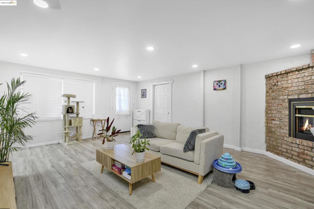 Welcome to 185 Evening Star Ct, Milpitas—a single-level 3-bedroom, 2-bath home offering far more than meets the eye. While listed on the public record sq ft, the property includes an extension that adds valuable living space, perfect for a home office, playroom, or bonus living area. In addition, the home features a separate attached unit with its own entrance, kitchenette, and induction cooktop. This private suite has previously earned nearly up to $3,000/month in mid-term rental income, making it an exceptional opportunity for investors or multi-generational living. The main home welcomes you with a cozy fireplace, vaulted ceilings, and a skylight that brightens up the living areas. The layout is functional and inviting, with room to update and customize to your style. Located in a sought-after Milpitas neighborhood, this property blends lifestyle and investment appeal. You’re just a 10-minute bike ride from BART, Trader Joe’s, the Great Mall, and 99 Ranch, plus within minutes of top-rated schools and major freeways. Low HOA fees add even more value. Whether you’re seeking a family home with extra space or an income-generating property, this one checks every box.