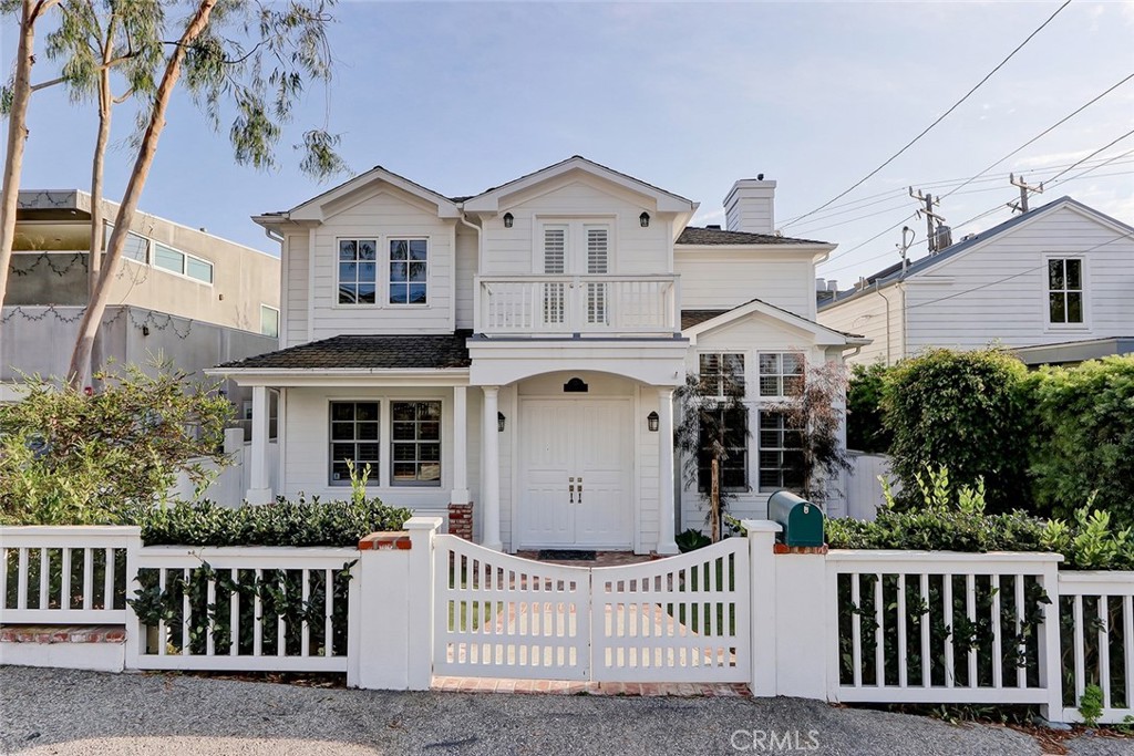 Located in the highly desirable Tree Section of Manhattan Beach, this fabulous executive style family home features a light, bright, and open traditional floor plan with 4 bedrooms plus office/study and 3.5 baths. The impressive double door entry leads to a formal foyer and the main floor living area which includes a classic formal living room with marble surround fireplace and a spacious formal dining room which can accommodate your holiday entertaining and more! The recently remodeled gourmet chef's kitchen has quartz countertops, stainless steel appliances, a center island cooktop, walk-in pantry, and adjacent charming breakfast nook. The kitchen is open to the family room which had a limestone fireplace and direct access to a private enclosed backyard area with brick patio, retractable exterior awning, an outdoor fireplace, and a built-in BBQ, making for easy indoor/outdoor entertaining. A main floor en suite bedroom with double french door entry is perfect as a second at-home-office or private retreat for your guests. The 2nd floor living area has two spacious bedrooms plus primary suite, a separate den/office or child's nursery/play room, and the laundry room. The elegant over-sized primary suite has a separate sitting area, 2-sided fireplace, vaulted ceiling, french doors to a private balcony/deck, and a walk-in closet with custom built-ins. The primary bathroom has a separate shower and spa tub, loads of counter space, and dual his/her sinks. Additional amenities in this wonderful home include newer french oak hardwood floors, vaulted ceilings, recessed lighting, plantation shutters, and more!! Plus, a recently installed high end water filtration system provides filtered drinking/soft water throughout the house. The detached 2-car garage has private gated access as well as a nice work bench area for your at home projects. This prime Tree Section location has great walkability to Sand Dune park, award winning Grandview elementary school, the green belt, Live Oak park and public tennis courts, downtown shops, restaurants, and the pier and beach! Now's your chance to enjoy Southern California coastal living at its best - hurry, this one won't last!!!