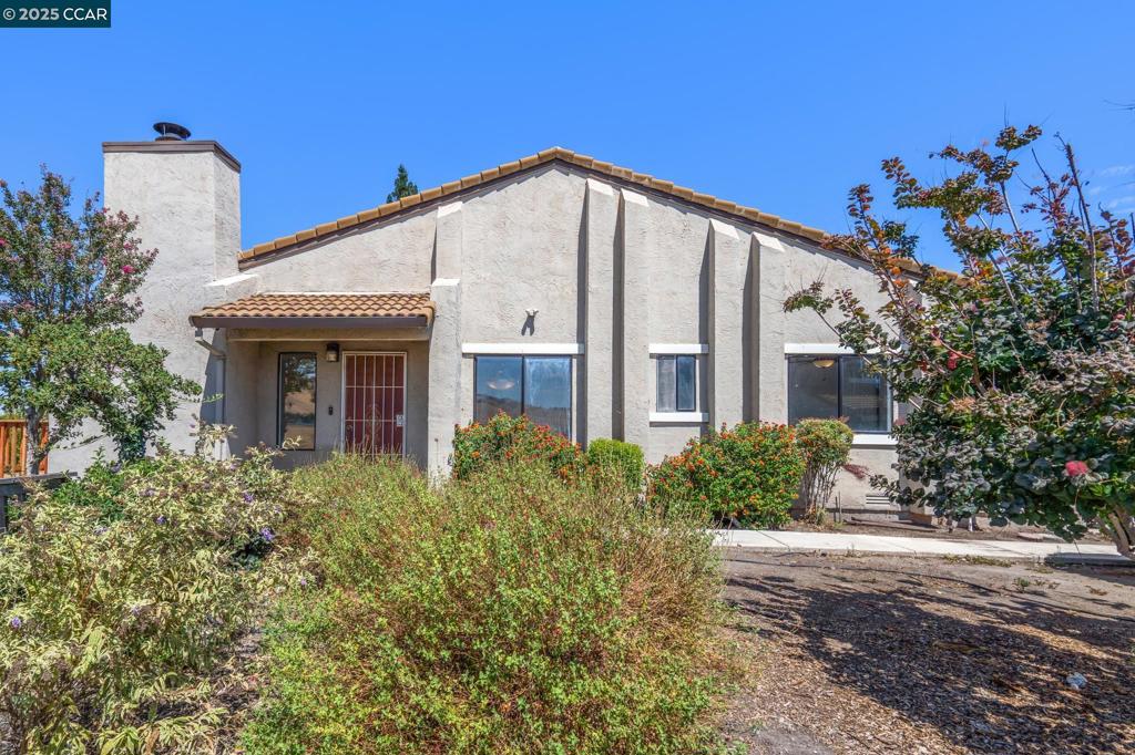 Welcome to 3513 Stone Place, a beautiful level in end-unit condo featuring 2 bedrooms and 2 bathrooms in the Summit community. Step into a spacious living room with a built-in bookshelf, cozy fireplace, and direct access to a brand-new private outdoor deck with wonderful views of rolling hills. The kitchen showcases a new oven, freshly painted cabinets, and abundant storage. LVP flooring flows throughout the main living spaces, complemented by new carpeting in the bedrooms, fresh interior paint, and a new garage door. Natural light floods every room in this charming home. Conveniently located near schools, grocery stores, public transit, and shopping malls. HOA dues of $430/month include access to the community pool, greenbelt areas, and common-area maintenance. Don’t miss your chance—come see it in person!