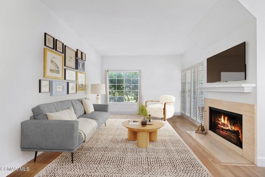Light & cheerful end-unit! This Oak Park 2+2.5 townhome with private courtyard and attached garage feels more like a house. Beautiful parks and hiking trails are right outside your door, with Deerhill Park only a mile away. Living room has a cozy fireplace and lots of windows. White & bright kitchen with sliders that open to a peaceful enclosed garden featuring citrus trees, outdoor lighting, flagstone pavers and water feature. Upstairs are two separate primary bedrooms both with new carpeting, ceiling fans, walk-in closets, and en-suite full baths. Washer & Dryer are conveniently located in the 1-car attached garage with extra storage space. There is also a reserved carport space next to the garage. Quiet and lovely ''Shadow Oaks'' community offers a pool, jacuzzi, clubhouse and gym. Close to highly sought after schools, Agoura Hills, and Westlake Village.
