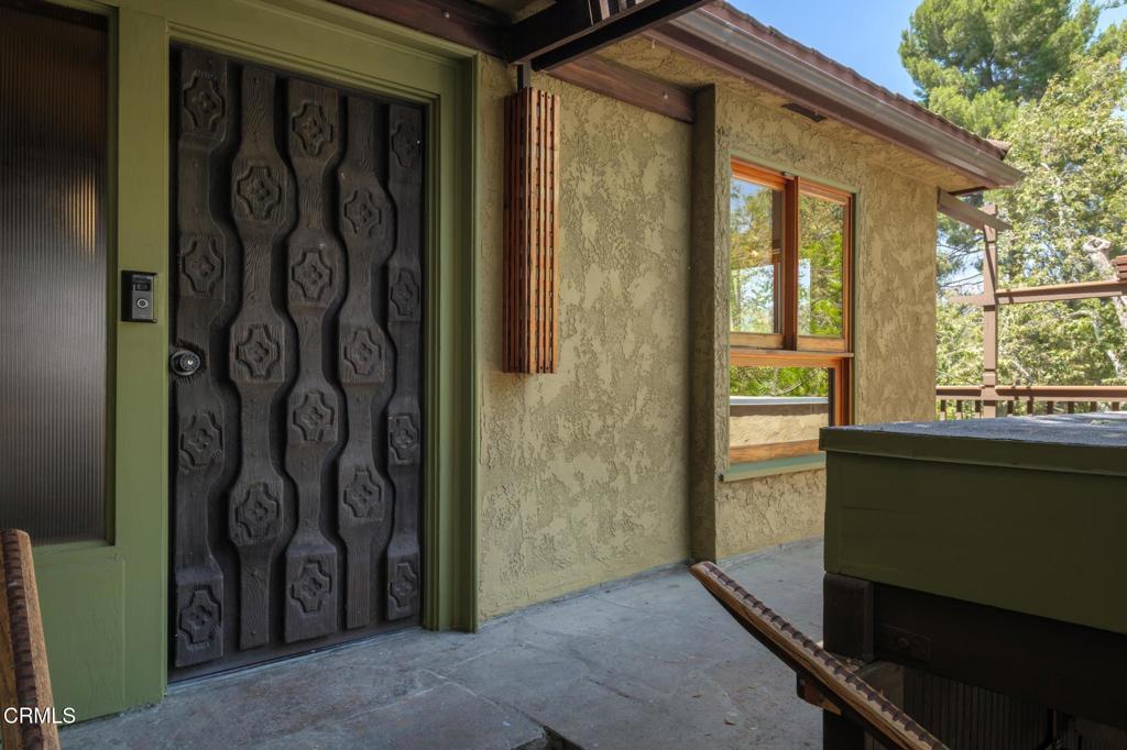 Private San Rafael Hills retreat! Secluded treehouse with 1,581 square feet of thoughtfully designed living space, this residence offers a groovy blend of comfort and style. Three spacious bedrooms, two well-appointed bathrooms, a welcoming ambiance, create an inviting atmosphere for both everyday living and entertaining. The living areas are bathed in natural light, highlighting the home's attractive features and tasteful finishes. The serene private patio is made for enjoying quiet mornings or hosting evening gatherings. Delightful architectural details from the mid century have been lovingly preserved by the owners. Thoughtful woodwork and the light filled solarium make this a must see spot. Additionally, the deck provides an ideal space for outdoor dining or simply unwinding while taking in the natural surroundings. The location is a winner, close to Old Pasadena, Highland Park and Eagle Rock.