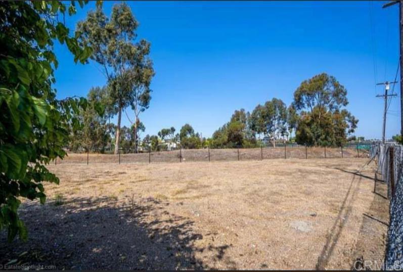 Prime lot of land. Act Now. Flat surface, with water, sewage, and electricity services available (not yet connected), Zoned RS-1-7, this land allows for up to 3,245 sq ft of total construction. Up to four units (a detached duplex with an ADU and JADU, plus a garage). Or a single-family home with an ADU and JADU (3 units) is permitted. Access: Quiet alley access on a lightly trafficked road.
