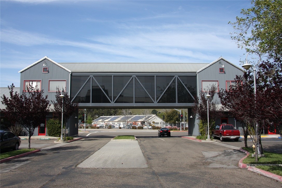 The "Bridge" Suite at the Pacific Coast Center spans the entrance and has fantastic exposure and natural light. The suite is mostly open and can function as anything from an office space to a fitness studio. Its open floor plan and windows make this suite unique to San Luis Obispo. The Pacific Coast Center is in a centrally located commercial center at the intersection of Madonna Road & S. Higuera Street. It is located at a signalized intersection and freeway access is very good.