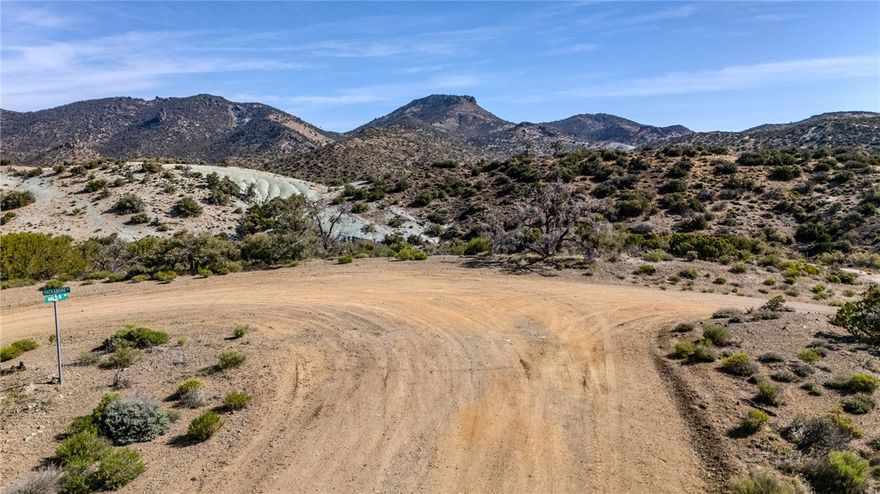Discover your own Private Mountain Sanctuary on this 2.45 Acre Lot!
Gaze out over the rolling hills and beautiful scenery while enjoying the mild four-season climate.This property offers the perfect balance of privacy and proximty to town. Priced to Sell!