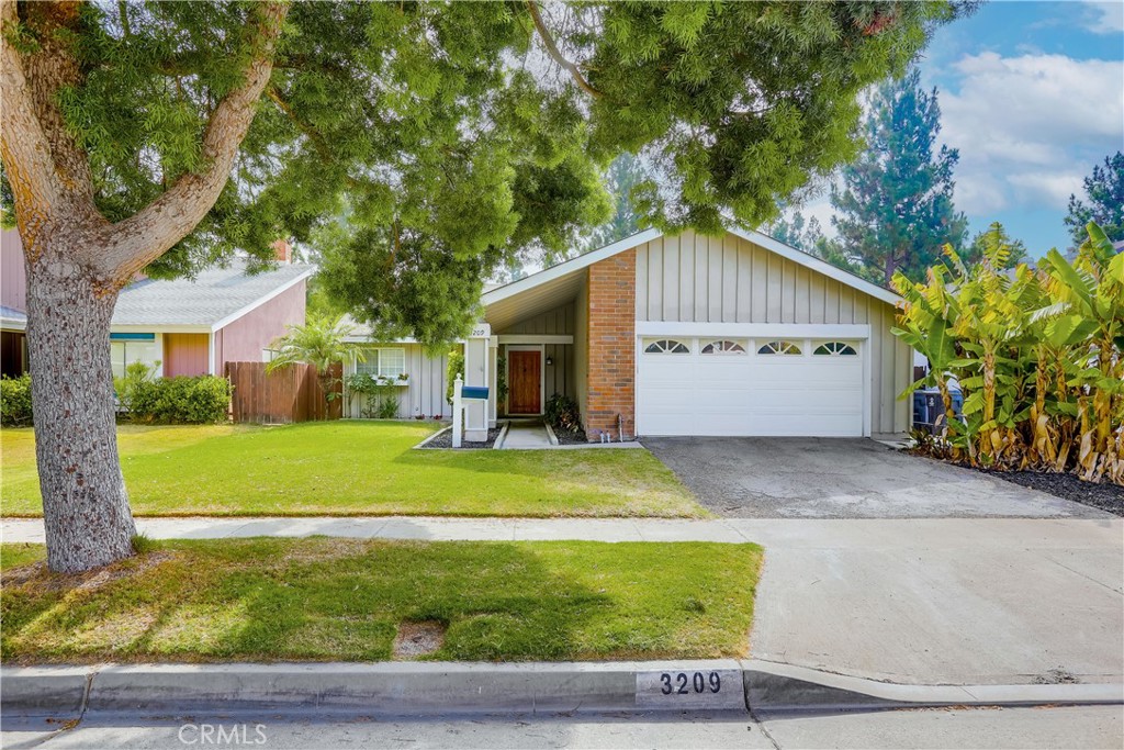 Welcome to 3209 South Center Street — a charming single-level home nestled on a quiet, tree-lined street in one of Santa Ana’s most desirable neighborhoods. This rarely available three-bedroom, two-bathroom home offers an ideal floor plan with generous living spaces and a seamless flow between the living room, dining area, and kitchen. Freshly painted interiors and thoughtful micro-updates provide a move-in ready experience while still allowing room for future personalization and upgrades. Located on a wide street with mature trees and pride of ownership all around, this home offers the best of both convenience and community. Enjoy being just minutes from world-class shopping and dining at South Coast Plaza, with easy access to major freeways, top-rated schools, and the sandy beaches of Orange County. Whether you're a first-time buyer, an investor, or looking to right-size into a well-kept home with strong bones and great potential, 3209 S. Center Street delivers. Don’t miss your chance to own a piece of this low-turnover, high-demand neighborhood.
