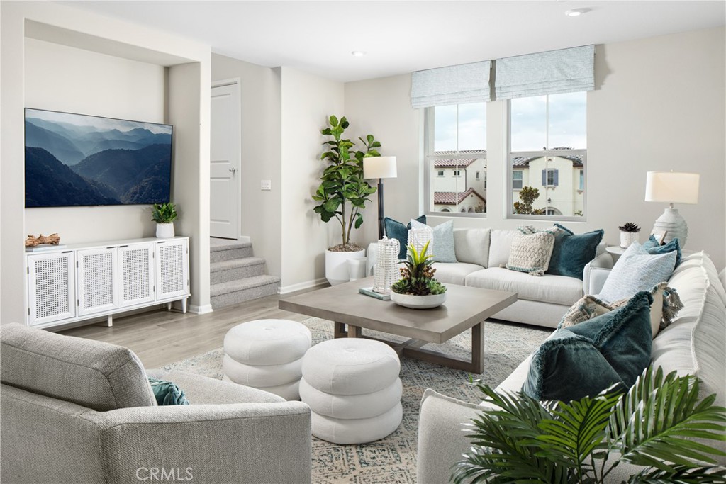 This three-story home offers flexible space and energy-efficient design in a smart, low-maintenance layout. The first floor includes a private bedroom and full bath — great for guests, a quiet office, or even a short-term rental setup. On the main floor, enjoy an open-concept Kitchen, Dining, and Great Room layout with easy access to a covered Deck, perfect for catching some sun or fresh air. A Kitchen island, walk-in pantry, and Powder Bath add convenience and function. Upstairs, the Primary Suite features a walk-in closet and dual-sink bath, with two additional bedrooms nearby plus a separate Laundry Room with optional side-by-side washer/dryer setup. You’ll also find thoughtful touches throughout like a 2-car garage, tankless water heater, dual-zone HVAC, and storage where it counts. Built by Beazer Homes — the nation’s #1 builder of DOE-certified Zero Energy Ready Homes — this home is designed for comfort, cleaner indoor air, and long-term energy savings thanks to its Indoor Air Plus certification. Home includes a 1-year fit and finish warranty. Ask about limited-time incentives and flexible financing options that may help reduce your closing costs or monthly payment. PLEASE NOTE: This home is ready for immediate occupancy. Photos are of model home.