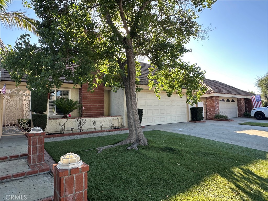 Newly renovated Anaheim Hills home with 5 Bedrooms and 3 Bathrooms! One bedroom with fireplace and 1 bathroom downstairs. Beautiful Granite kitchen with new appliances including refrigerator. Large family room with built in cabinets. New laminated flooring throughout the house. Gated front court and nice manicured front and backyard. Plenty of room to BBQ. Extra storage shed in the backyard. 2 car attached garage with large driveway. Centrally located, close to award winning schools and walking distance to restaurants, shopping centers and Park. Easily accessible to the 241, the 91 & 55 FWY.