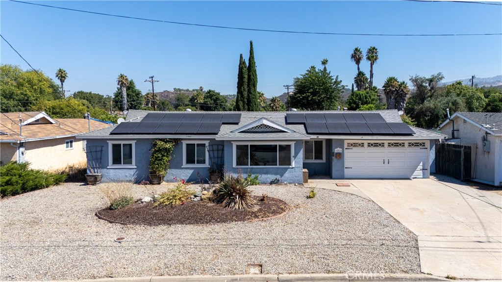 Charming Single-Story Home with Bonus Space and Owned Solar!
Welcome to this move-in ready 3 bedroom, 1 bath home situated on a spacious, completely flat lot with tons of potential. Featuring a remodeled kitchen, tile flooring throughout, and a functional layout, this property offers both comfort and opportunity.
While tax records show 962 sq ft, an appraisal at the time of the sellers' purchase measured approximately 1,156 sq ft of living space (buyer to verify all permits). The expanded layout provides additional flexibility—whether you're looking for extra room to relax, work, or entertain.
Enjoy peace of mind with a brand-new HVAC system, and take advantage of fully paid-off solar at the close of escrow—owned, not leased! The refrigerator and washer/dryer are included, making this a true turn-key opportunity.
Outside, you’ll find a greenhouse, a large storage shed, and low-maintenance landscaping—ideal for gardening, hobbies, or future development. The generous lot provides plenty of space to personalize and grow with your needs.
Don’t miss this chance to own a single-level home with upgrades, extra space, and room to make it your own!