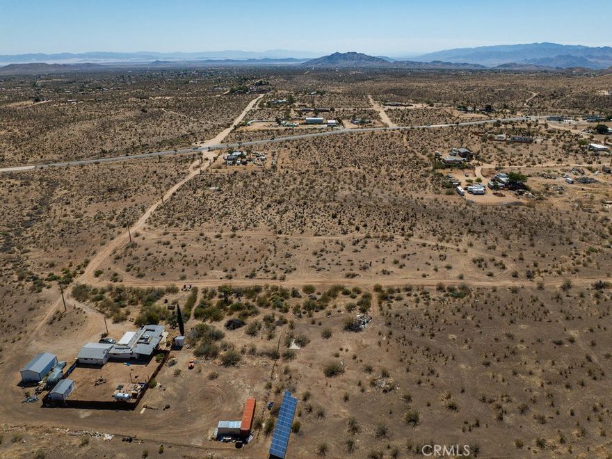@@@ Rural Mixed Use SPA @@@Larger lot strategically located just about 700 feet away from Hwy 247 (Old Woman Springs Rd) entrance. Power lines are directly in front of the lot on Mesa Dr. Water service is provided by Hi-Desert Water District. A septic tank is necessary and common in the area. Everything you need is just a short drive away. This lot is in Yucca Valley jurisdiction and zoned for industrial which allows a wide range of uses. It’s also in Rural Mixed Use SPA (special policy area) therefore a single-family residence is allowed when associated with an industrial business (e.g., a cabinetry maker who has a home and workshop on a single property). This is really an unique opportunity that offers endless possibilities. Do not miss this chance to make your dream come true on this blank canvas. Please note that the boundaries represented in the photos are only an estimation. The property can be located with GPS coordinates 34.178486, -116.430788.