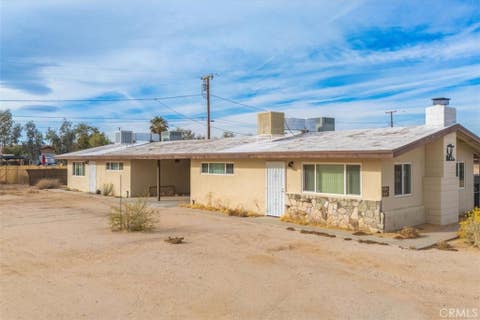 Photo of 6368 Tamarisk Avenue, 29 Palms, CA 92277 (MLS # JT26178134)