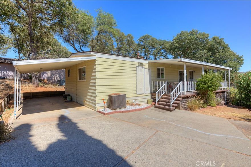 This charming 2-bedroom, 2-bathroom home offers comfort, convenience, and a touch of nature. Located in the desirable Kelly Ridge community, it’s just minutes from Lake Oroville and the Visitors Center, making it perfect for anyone who loves the outdoors. Step inside to find a well-maintained home featuring a newer roof, dual-pane windows, and a smart layout. The spacious living area are is great for hosting friends and family, plus there is a bonus room off the laundry—ideal for a home office, hobby space, or extra storage. The fenced backyard provides a great space for pets, gardening, or entertaining, while the covered front porch is perfect for enjoying quiet mornings or evening sunsets with partial views of the surrounding hills. A carport ensures covered parking year-round. Whether you’re looking for a comfortable primary residence or a weekend getaway near the lake, this home has it all.