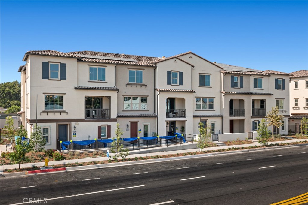 Welcome to this stunning modern tri-level home in the GATED Mirasol community! This brand-new, energy-efficient Plan 4 offers 3 bedrooms (one bedroom on the 1st floor), 3.5 bathrooms, and 1,703 square feet of thoughtfully designed living space, complete with an attached 2-car side by side garage. Upon entering, you're welcomed by a bright foyer with a convenient storage closet, 1 bedroom and 1 full bath downstairs and direct garage access. As you ascend to the main level, you'll discover an open-concept living area featuring a charming balcony, perfect for entertaining or relaxing in the fresh air. The beautifully appointed kitchen boasts white shaker cabinets, a large island with quartz countertop, and LG stainless steel appliances, including a range, microwave, and dishwasher. Limited time to select flooring.
On the third level, you'll find two spacious bedrooms, each with its own en-suite bathroom. This level also includes a laundry room for added convenience.
Centrally located near schools, parks, and more, with easy access to the I-10 and I-605 freeways, offering a smooth commute to both DTLA and Orange County.