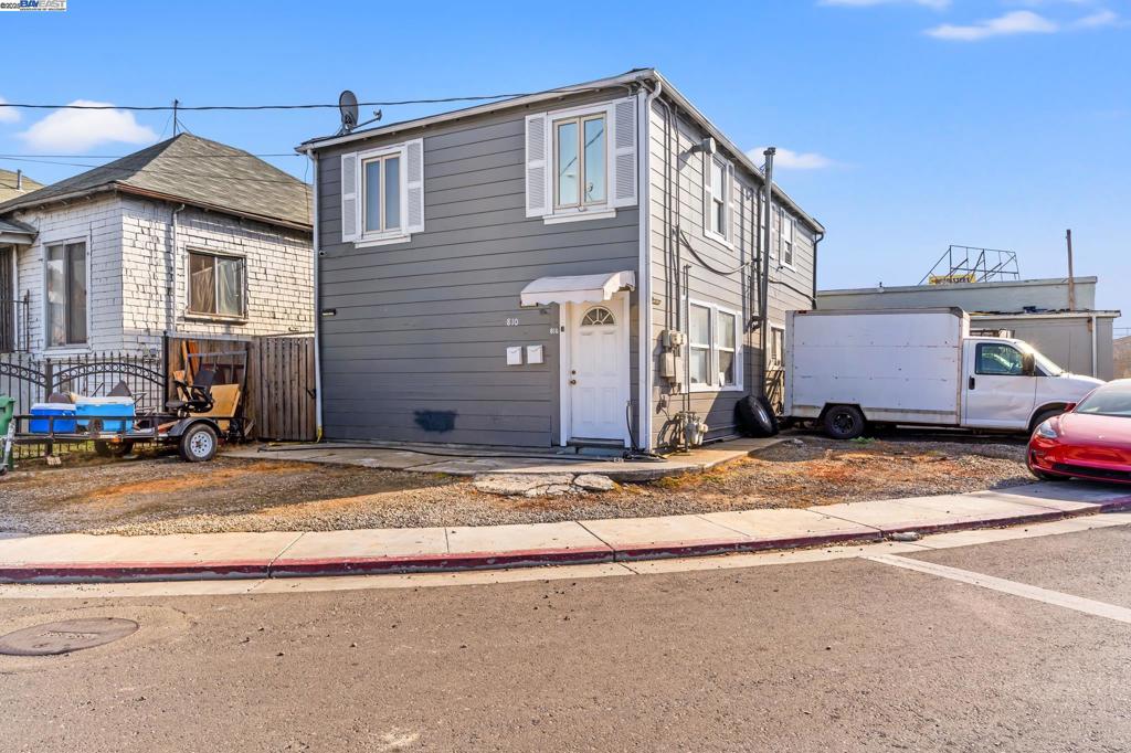 **UNIQUE LIVE/WORK DUPLEX, plus 2,300 SF ATTACHED WORKSHOP in Oakland's Charming Jingle Town Neighborhood** This rare, versatile property offers the ultimate opportunity for home buyers or investors seeking a Spacious Live/Work Lifestyle in the heart of the San Francisco Bay Area. This Duplex features two units: a Bright 2-bedroom, 1-bath Upstairs and a Roomy 1-bedroom, 1-bath Downstairs - each boasting over 900 SF of well-maintained space with beautiful, nearly-new hardwood flooring. The property includes an attached 2,500 SF WORKSHOP — ideal for a variety of business ventures or as an income-generating rental. With its own Bathroom and Shower, this versatile space is perfect for Warehouse, Art Studio, or workshop needs. Live close to your business or rent out the workshop to maximize income potential. Nestled in Oakland’s unique Jingle Town - Near Alameda - this friendly, close-knit neighborhood exudes community charm, with 90% of residents being families. TOP-RATED LAZEAR CHARTER ACADEMY is just a block away, and a complete shopping center—featuring a grocery store, restaurants, Starbucks, banks, and more — is a short two-blocks away, making daily errands a breeze. Convenience abounds with easy access to public transportation, BART and AC Transit, plus HWY 880