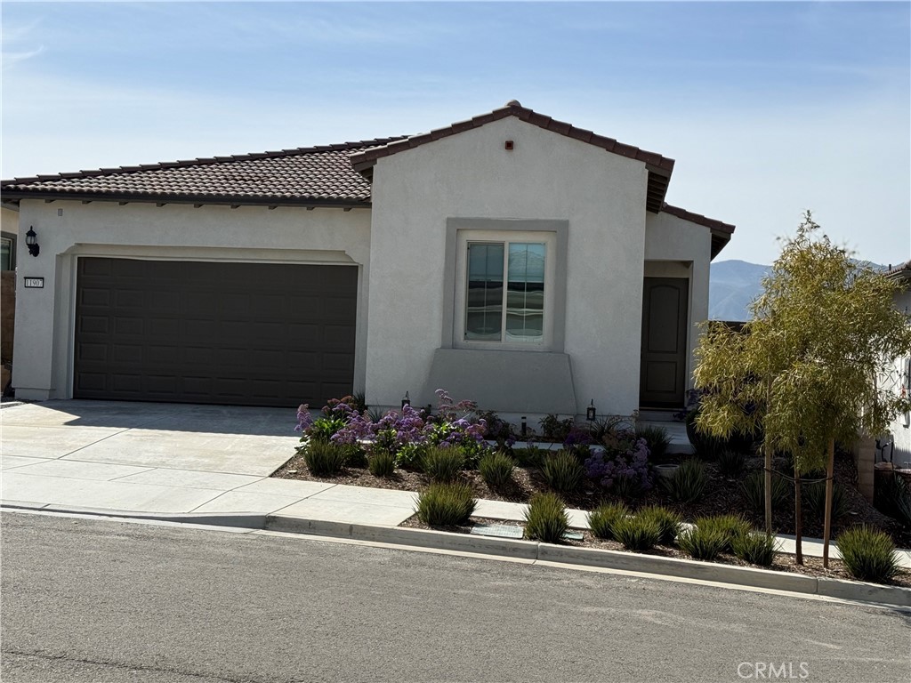 Come take a look at this final Aubrey Plan with a panoramic view!- 2 bedroom 2 bath home located in the Dell Web community at Terramor. This one year new home is located in Cedarwood, a 55+ community. The yard is low maintenance, with artificial turf and patios in the back yard, and drought resistant landscaping in the front yard. The home boasts white shaker cabinets, with quartz countertops, with warm LVP flooring, and carpet in the bedrooms. There are drapes and roller shades on the windows. The California room style patio allows you a lovely space to enjoy the spectacular view. The community offers indoor and outdoor pools, hot tubs, locker rooms with Saunas, pickle ball courts, tennis courts, Bocce ball courts, gym and wellness studio, outdoor gathering spaces with outdoor cooking areas, and a pavilion with a bar. This home is located with easy access to the I-15 freeway, near the Dos Lagos shopping center. Sellers are very motivated and tenant can move quickly.