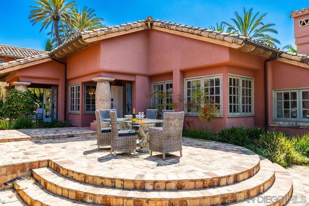 This listing is for the casita only - not the main residence. Inspired by the famous Rancho Valencia Resort & Spa, this unparalleled & opulent Fairbanks Ranch estate is an idyllic sanctuary for those who appreciate elegance and style with a focus on indoor-outdoor living. Features of this 1,700 sq ft house include 2 en-suite bedrooms complete with 2 full baths, terra cotta floors, fully-equipped kitchen, beamed ceilings, open living space with ambient fireplace, plus office nook for those who may need a dedicated workspace. You will certainly appreciate the accommodations as there is a custom California King bed in one suite and 2 queen beds in the secondary suite. There is driveway space available for up to 4 cars. Relish in the ultimate long vacation in this spectacular, light filled guest abode - luxury, endless activities, nature & tranquility are yours. See supplement for more details! Rancho Santa Fe is a beautiful & exclusive neighborhood with a rich history & luxurious attractions from golfing & tennis to art galleries & spas. With over 75 acres of park-like grounds & pristine amenities is a gated community of exclusive estates called Fairbanks Ranch. Immerse yourself in a charming living experience with amenities that include: private 24-hour armed security force patrolling the community with two main entrances & "resident only" gates with 24-hour access, 4,000 sq ft clubhouse with full kitchen, a dance floor, fireplace, an executive conference room, expansive covered & open patio areas, & a porte-cochère entrance overlooking the central lake, twin lakes & hiking trails, 5 regulation tennis courts, lighted & recently renovated, pickleball, equestrian center with arenas, trails, boarding & lessons available, park & fitness course, & library for residents enjoyment.