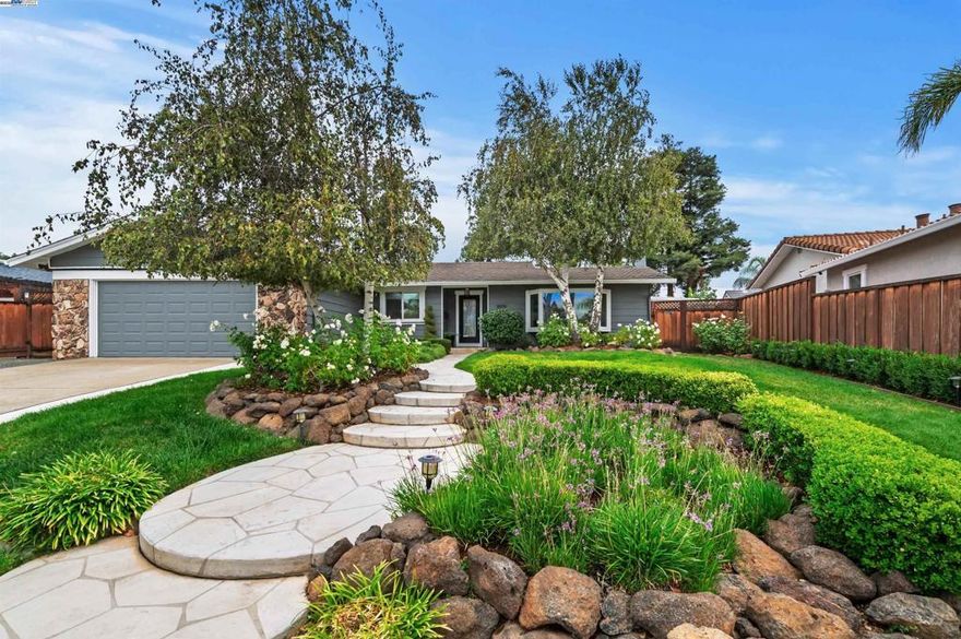 Pride of ownership shows in this sought after 3 bedroom, 2bath home in Livermore's desirable  Shadowbrook neighborhood. Freshly painted on the exterior and 90 percent of the interior, new manufactured wood floors the  Family/living room offers fireplace with surround custom cabinetry with leaded glass doors and shelves for personal display items.  The kitchen offers an open floor plan to host a large table, island with barstool seating, custom bar/coffee station area, a sliding glass door to an "Oasis" of a backyard with multiple sitting areas, in ground pool, outdoor kitchen area, covered gazebo area, endless entertaining opportunities, new sod, side yard for possible bocce court, she/he/kids sheds, garden area-whatever your vision may be and an in ground pool.  The 10,308 square foot lot makes this location one can do many things with longterm. Livermore Valley schools are nearby, plenty of shopping, eateries, Downtown Livermore, Livermore Wine Country, ACE train, Sycamore Grove Park and Alden Lane Nursery are all easy access from the Shadowbrook Neighborhood.