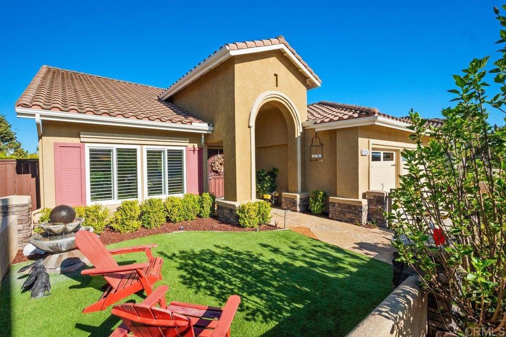 Welcome to this beautifully updated single-story home in one of Oceanside’s most desirable neighborhoods. Offering three bedrooms, two bathrooms, and 2,270 sq. ft. of living space, this home features a gourmet kitchen, open living and dining areas, and a warm fireplace perfect for cozy evenings. The primary suite connects directly to the third bedroom, which has been transformed into a private retreat and office—a versatile space for working from home, a nursery, or your own quiet getaway. Step outside to a low-maintenance backyard with a built-in BBQ, fire pit, and sweeping mountain views—ideal for entertaining or relaxing with family. The location is just as impressive: close to shopping and dining with easy freeway access, yet tucked away from the noise. In just 10 minutes you can be at Oceanside’s sandy beaches, the iconic Oceanside Pier, or the Harbor for waterfront dining and boating. Families will also love being near great local schools, parks, and the scenic San Luis Rey River bike trail, with LEGOLAND only 15–20 minutes away. This home truly blends comfort, versatility, and coastal lifestyle—don’t miss your chance to make it yours!