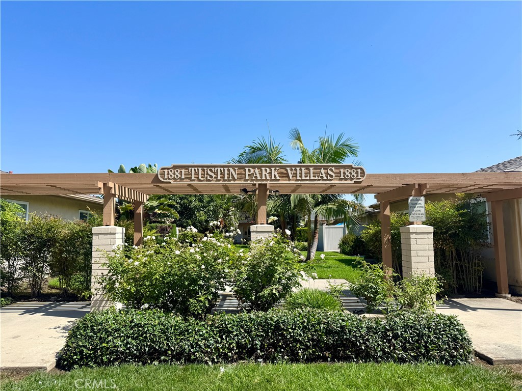 This thoughtfully designed single-story condo is located in the highly desirable Tustin Park Villas community. Offering 2 bedrooms and 2 bathrooms, this home features an open-concept layout with no interior steps, wood flooring throughout, and tile in both bathrooms. The kitchen boasts a breakfast bar that doubles as additional counter space, ideal for casual dining or meal prep, while both bathrooms include shower/tub combinations. A private patio provides a perfect spot to relax or entertain. Community amenities include a large pool, multiple laundry facilities, and beautifully landscaped grounds with mature trees and expansive grassy areas, creating a serene, park-like atmosphere.