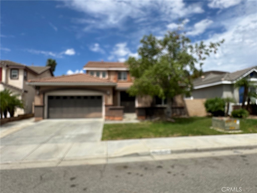 POOL HOME FOR LEASE ! 4-bedroom, 3-bath home is located in a desirable Menifee neighborhood. Designed for entertaining, it features an open-concept floor plan and a private backyard with a saltwater pool and spa, plus no rear neighbors. The modern kitchen offers stainless steel appliances, includes a large walk-in pantry and opens to the family room with a cozy fireplace. One bedroom is conveniently located downstairs—ideal for guests or a home office—while the remaining three bedrooms and laundry room are upstairs. The spacious primary suite offers a walk-in closet and an oversized bathroom. Additional features include ceiling fans in the family room and three bedrooms, dual A/C, and a 3-car tandem garage. New carpet make this home move-in ready. Freedom Crest Elementary is located across the street and Menifee Lakes Golf Course & Country Club is nearby.