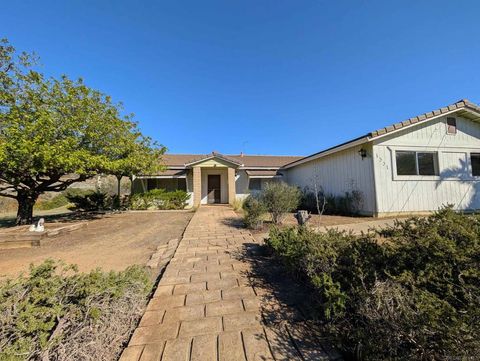 Photo of 1331 Ramblewood Rd Rd, Alpine, CA 91901 (MLS # 250045793SD)