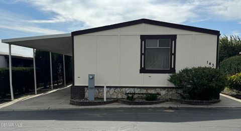 Photo of 24303 Woolsey #143, Canoga Park, CA 91304 (MLS # 224000906)