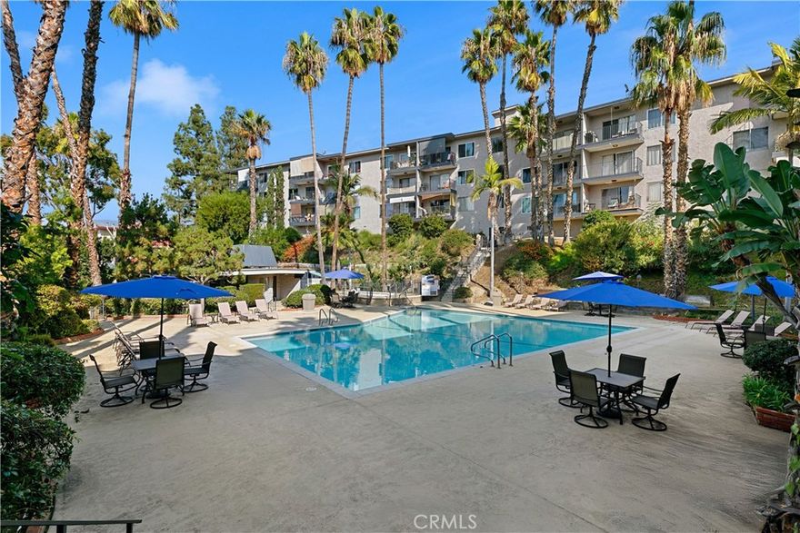 A beautiful top-floor penthouse-style condo with only one common wall and with city and mountain views. Located in prime Glendale on a cul-de-sac street. This beautifully designed 2-bedroom, 2-bathroom condo offers the perfect blend of comfort, style, and everyday convenience. Step inside to discover bright and inviting living spaces, featuring bamboo flooring, elegant white baseboards, and modern lighting that create a warm and refined atmosphere. The open-concept kitchen is both functional and welcoming, featuring stone countertops, dark wood cabinetry, ample storage, and a breakfast bar that seamlessly flows into the living and dining areas, ideal for entertaining or enjoying quiet mornings at home. A highlight of this home is the private balcony, a peaceful retreat where you can unwind and take in panoramic city and sunset views. A perfect spot to relax and recharge. Both bedrooms are filled with natural light and offer generous closet space, complemented by continued bamboo flooring, which balances comfort with thoughtful design. Interior features include: an updated electrical panel, an updated AC controller, a newer HVAC system, and water heater. The property was remodeled about 5 years ago. Enjoy the best of community living with resort-style amenities, including a sparkling pool, Spa, a serene courtyard, and an on-site gym. Practical perks include two dedicated parking spaces with additional storage, as well as ample guest parking. In a city where convenience and charm are hard to come by, this Glendale gem delivers it all with stunning views that remind you to slow down and savor the moment. Don’t miss this opportunity - schedule your private showing today!