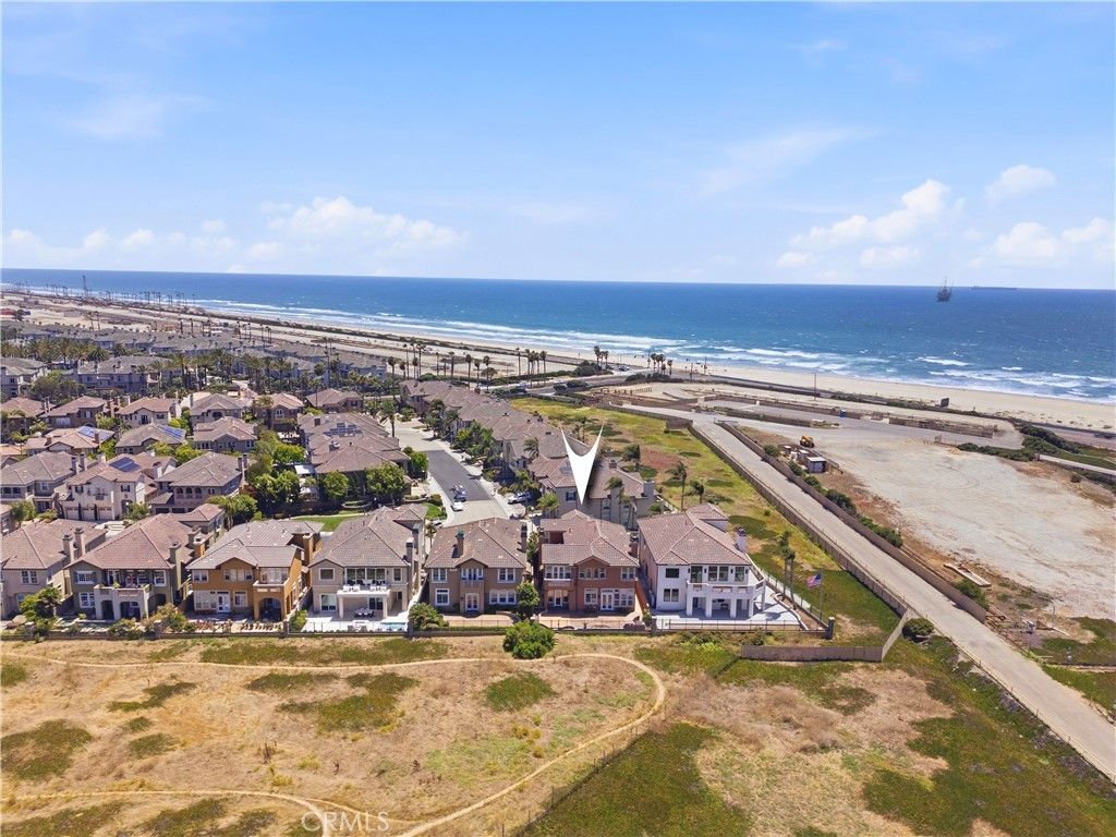 Photo of 5571 Ocean Terrace DR, Huntington Beach, CA 92648 (MLS # OC26153129)