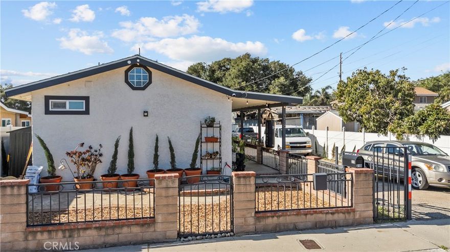 Located in small town Santa Paula, welcome to this 2 bed 1 bath home, perfect for a starter home. This 720 square foot home features a beautiful kitchen with an island. There are several upgrades to this home including a new ADT system, wrought iron fence at the entrance and storage shelving in several areas. Located just a couple of blocks from downtown Santa Paula this home offers cozy living with local amenities just minutes away.