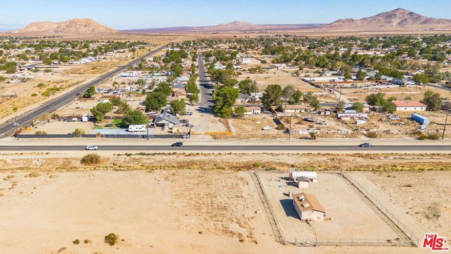 Great opportunity to own a commercial lot in the growing community of Lake Los Angeles! This parcel, located at 16520 E Avenue O (APN: 3073-004-026), offers excellent visibility and frontage along Avenue O, with convenient access to major thoroughfares leading to Palmdale, Lancaster, and the Antelope Valley. Zoned for commercial use (buyer to verify permitted uses with Los Angeles County Planning), the property provides a range of possibilities including retail, office, or service-oriented development. Whether you're an investor looking for long-term growth potential or a developer ready to build, this lot offers strong upside in a high-demand area. Nearby residential neighborhoods, schools, and local businesses create steady traffic and a strong customer base. Don't miss the chance to secure a piece of commercial property in this fast-developing region. Buyer to verify zoning, utilities, and development requirements with the County.