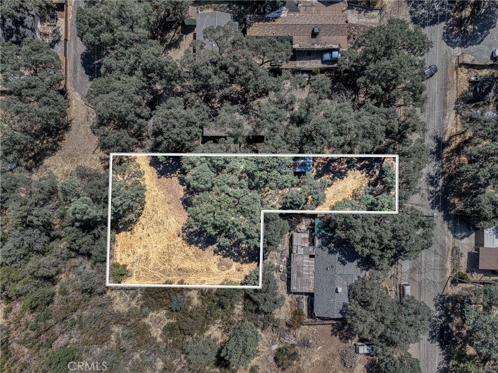 Welcome to 15862 21st Ave in Clearlake, CA – a fantastic vacant lot ready for your dream home. This R1-zoned property sits on flat, buildable land that's perfect for construction. The entire lot comes fully fenced, giving you privacy and clear property boundaries from day one.
You'll love the convenience of having all utilities ready to connect. Public sewer, public water, and PG&E are all available, making your building process much smoother—no need to worry about well drilling or septic systems here.
The location puts you close to everything you need in Clearlake. Adventist Health Clear Lake is just minutes away from medical care, while grocery shopping is easy with Foods Etc and Safeway nearby. Clear Lake Campground offers excellent outdoor recreation opportunities, and the Clear Lake Education Centers serve the local community.
This neighborhood offers a nice mix of residential living with easy access to services. The flat terrain makes construction straightforward, and the fenced perimeter gives you a head start on landscaping plans. Whether you're looking to build your forever home or an investment property, this lot provides the blank canvas you've been seeking.
The ready-to-build status means you can start your project sooner rather than later. With utilities at the street and level ground to work with, you'll save time and money on site preparation. This is your opportunity to create something special in a growing Clearlake community.