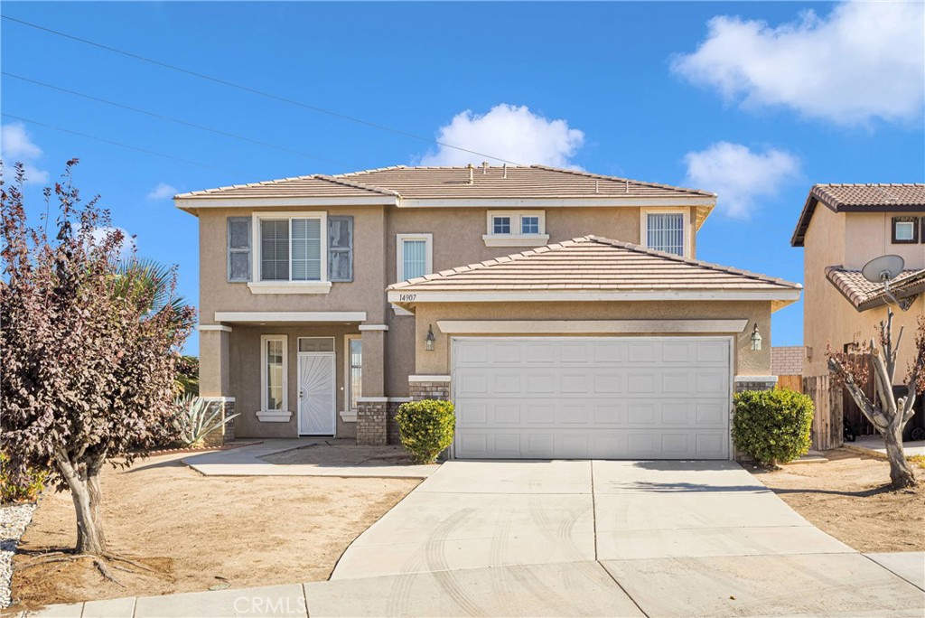 Welcome to 14907 Cottontail Lane in vibrant Victorville, CA! This stunning 3-bedroom, 3-bathroom gem spans 1,795 square feet of modern living space, perfectly situated on a 6,098 square foot lot.
Step inside and be greeted by an open-concept layout that effortlessly combines style and comfort. The spacious living area flows seamlessly into a contemporary kitchen featuring sleek countertops, well maintained appliances, and ample cabinetry – a dream for both cooking enthusiasts and casual snackers alike.
The primary suite offers a serene retreat with an en-suite bathroom boasting dual sinks and a luxurious walk-in shower. The other two bedrooms are generously sized, each with access to well-appointed bathrooms, ensuring convenience and privacy for everyone.
Outside, the sizable backyard is your blank canvas, ready for your personal touch. The attached two-car garage provides additional storage space and easy access to your vehicles.
Located in a community with diverse amenities, you'll find plenty of options for dining, shopping, and entertainment nearby. This home is perfect for those looking to enjoy all the comforts of modern living in a dynamic setting.
Don't miss the chance to make 14907 Cottontail Lane your new address. Schedule a viewing today and experience all this wonderful home has to offer!